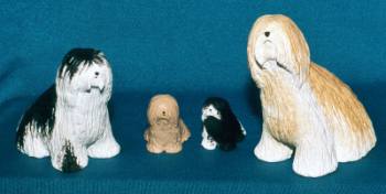Tibet Terrier Figuren sitzend